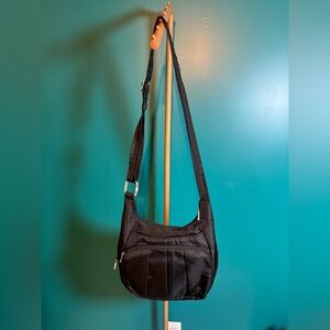 Travelon Black Messenger Bag with Adjustable Strap and Soft Structure